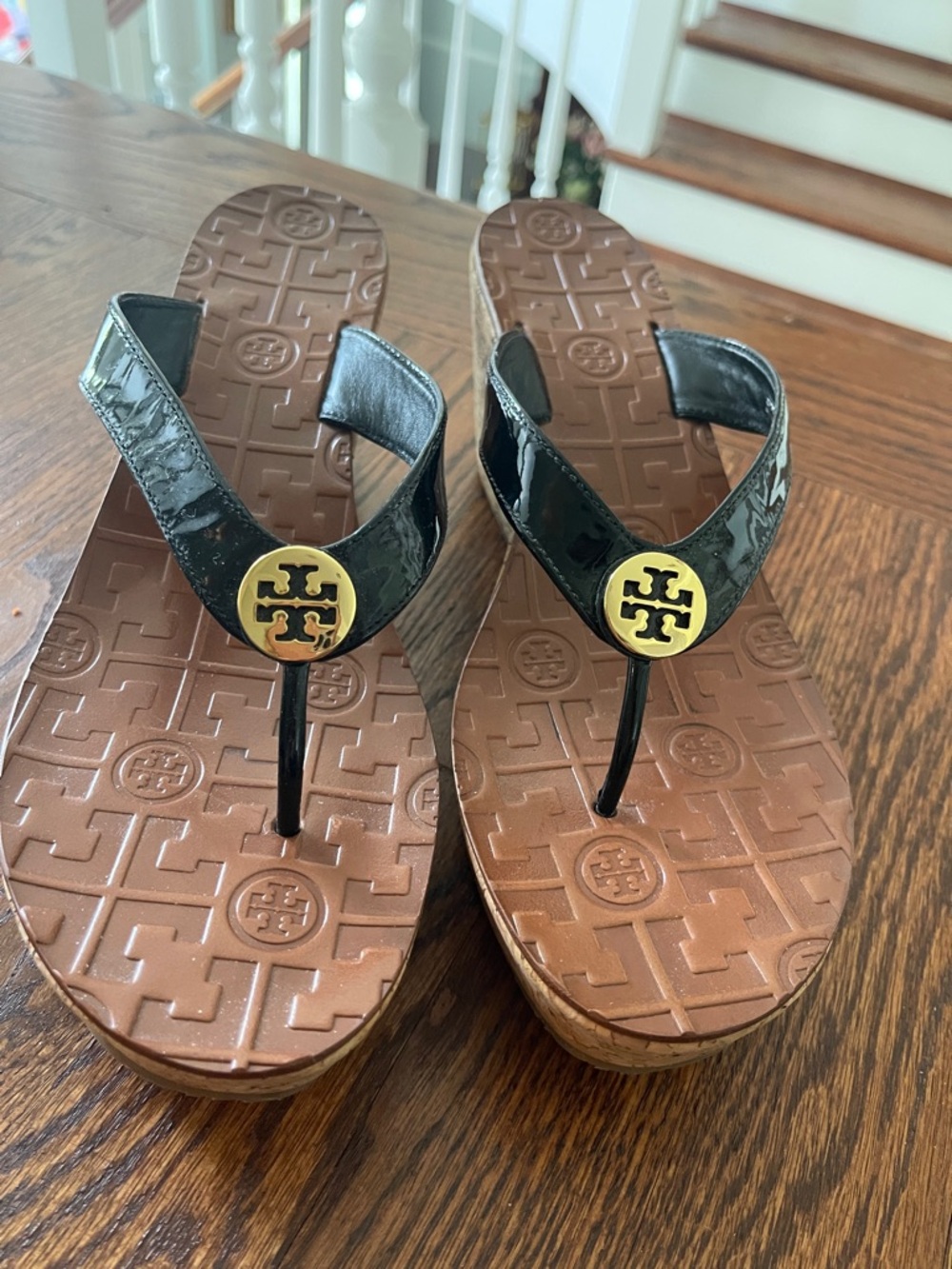 Tory Burch Black Patent Leather Wedge Thong Sandals with Gold Logo Medallions